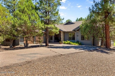 Overlooking the lush fairways and a tranquil water feature of on Torreon Golf Club in Arizona - for sale on GolfHomes.com, golf home, golf lot