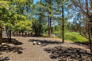 Overlooking the lush fairways and a tranquil water feature of on Torreon Golf Club in Arizona - for sale on GolfHomes.com, golf home, golf lot