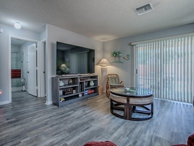 Welcome to a delightful retreat in the vibrant heart of The on El Diablo Executive Golf Course in Florida - for sale on GolfHomes.com, golf home, golf lot