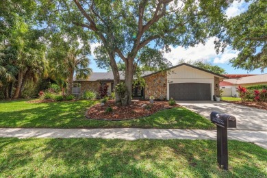 Under contract-accepting backup offers. This gorgeous Coastal on East Lake Woodlands Country Club in Florida - for sale on GolfHomes.com, golf home, golf lot