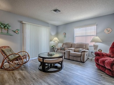 Welcome to a delightful retreat in the vibrant heart of The on El Diablo Executive Golf Course in Florida - for sale on GolfHomes.com, golf home, golf lot