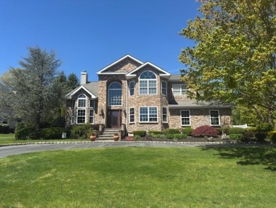 Welcome to One Schoolhouse Court!
This impeccable stone facade on Pine Hollow Country Club in New York - for sale on GolfHomes.com, golf home, golf lot