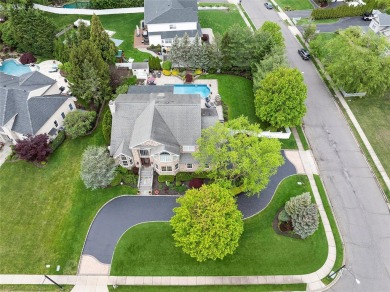 Welcome to One Schoolhouse Court!
This impeccable stone facade on Pine Hollow Country Club in New York - for sale on GolfHomes.com, golf home, golf lot