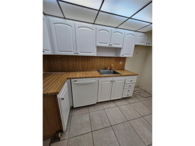 Location Location Location! Come view this 2 bedroom 2 bathroom on Pembroke Lakes Golf Club in Florida - for sale on GolfHomes.com, golf home, golf lot