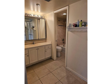 Location Location Location! Come view this 2 bedroom 2 bathroom on Pembroke Lakes Golf Club in Florida - for sale on GolfHomes.com, golf home, golf lot