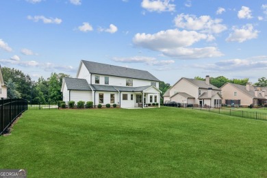 Imagine waking up to stunning views of the green, enjoying your on Traditions of Braselton Golf Club in Georgia - for sale on GolfHomes.com, golf home, golf lot