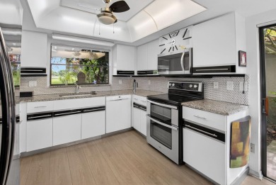 Beautiful two-story home located in the desirable 55+ community on Indian Spring Golf and Country Club in Florida - for sale on GolfHomes.com, golf home, golf lot