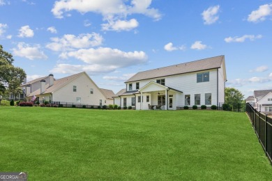 Imagine waking up to stunning views of the green, enjoying your on Traditions of Braselton Golf Club in Georgia - for sale on GolfHomes.com, golf home, golf lot