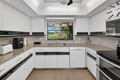 Beautiful two-story home located in the desirable 55+ community on Indian Spring Golf and Country Club in Florida - for sale on GolfHomes.com, golf home, golf lot