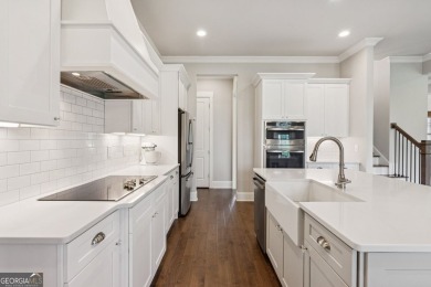 Imagine waking up to stunning views of the green, enjoying your on Traditions of Braselton Golf Club in Georgia - for sale on GolfHomes.com, golf home, golf lot