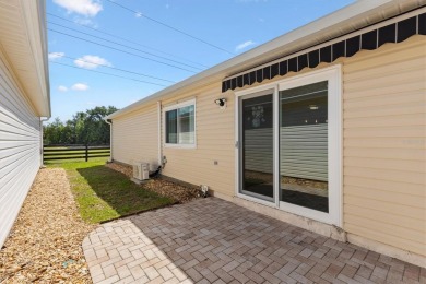 Tucked away in the Village of Alhambra, this charming 2 Bedroom on The Links of Spruce Creek in Florida - for sale on GolfHomes.com, golf home, golf lot