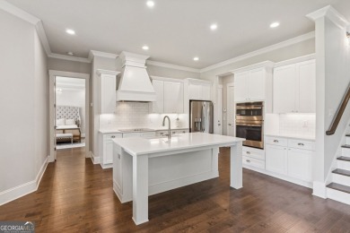 Imagine waking up to stunning views of the green, enjoying your on Traditions of Braselton Golf Club in Georgia - for sale on GolfHomes.com, golf home, golf lot
