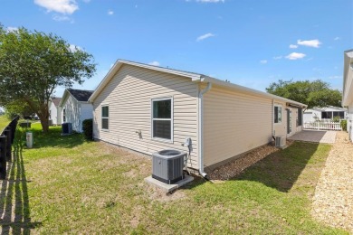 Tucked away in the Village of Alhambra, this charming 2 Bedroom on The Links of Spruce Creek in Florida - for sale on GolfHomes.com, golf home, golf lot