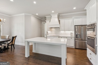 Imagine waking up to stunning views of the green, enjoying your on Traditions of Braselton Golf Club in Georgia - for sale on GolfHomes.com, golf home, golf lot
