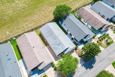Tucked away in the Village of Alhambra, this charming 2 Bedroom on The Links of Spruce Creek in Florida - for sale on GolfHomes.com, golf home, golf lot