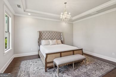 Imagine waking up to stunning views of the green, enjoying your on Traditions of Braselton Golf Club in Georgia - for sale on GolfHomes.com, golf home, golf lot