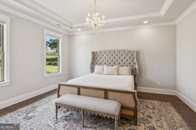 Imagine waking up to stunning views of the green, enjoying your on Traditions of Braselton Golf Club in Georgia - for sale on GolfHomes.com, golf home, golf lot