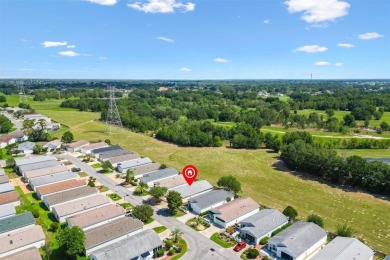 Tucked away in the Village of Alhambra, this charming 2 Bedroom on The Links of Spruce Creek in Florida - for sale on GolfHomes.com, golf home, golf lot