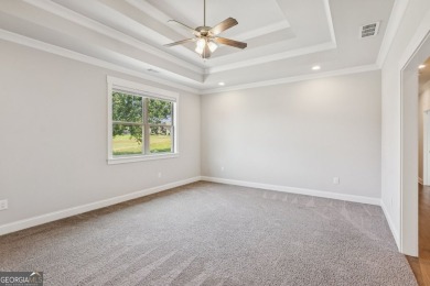 Imagine waking up to stunning views of the green, enjoying your on Traditions of Braselton Golf Club in Georgia - for sale on GolfHomes.com, golf home, golf lot