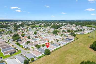 Tucked away in the Village of Alhambra, this charming 2 Bedroom on The Links of Spruce Creek in Florida - for sale on GolfHomes.com, golf home, golf lot