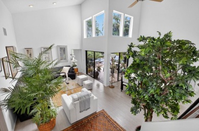 Beautiful two-story home located in the desirable 55+ community on Indian Spring Golf and Country Club in Florida - for sale on GolfHomes.com, golf home, golf lot