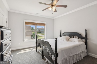 Imagine waking up to stunning views of the green, enjoying your on Traditions of Braselton Golf Club in Georgia - for sale on GolfHomes.com, golf home, golf lot