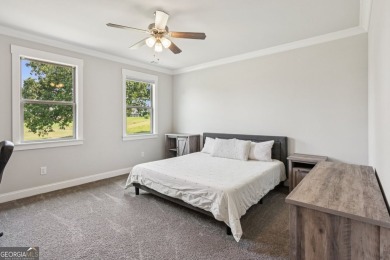 Imagine waking up to stunning views of the green, enjoying your on Traditions of Braselton Golf Club in Georgia - for sale on GolfHomes.com, golf home, golf lot