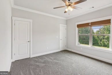 Imagine waking up to stunning views of the green, enjoying your on Traditions of Braselton Golf Club in Georgia - for sale on GolfHomes.com, golf home, golf lot