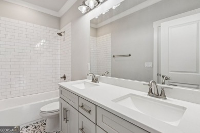 Imagine waking up to stunning views of the green, enjoying your on Traditions of Braselton Golf Club in Georgia - for sale on GolfHomes.com, golf home, golf lot