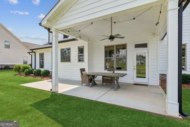 Imagine waking up to stunning views of the green, enjoying your on Traditions of Braselton Golf Club in Georgia - for sale on GolfHomes.com, golf home, golf lot