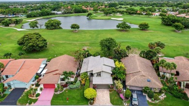 Beautiful two-story home located in the desirable 55+ community on Indian Spring Golf and Country Club in Florida - for sale on GolfHomes.com, golf home, golf lot