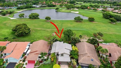 Beautiful two-story home located in the desirable 55+ community on Indian Spring Golf and Country Club in Florida - for sale on GolfHomes.com, golf home, golf lot