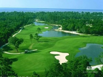 This beautiful southern living  home overlooks the 5th hole on on Peninsula Golf and Racquet Club in Alabama - for sale on GolfHomes.com, golf home, golf lot