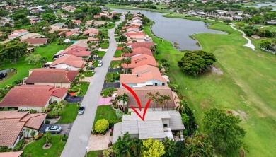 Beautiful two-story home located in the desirable 55+ community on Indian Spring Golf and Country Club in Florida - for sale on GolfHomes.com, golf home, golf lot