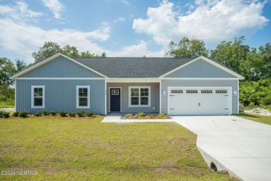 Your dream home is nearing completion in the charming, gated on Harbour Point Golf Club in North Carolina - for sale on GolfHomes.com, golf home, golf lot