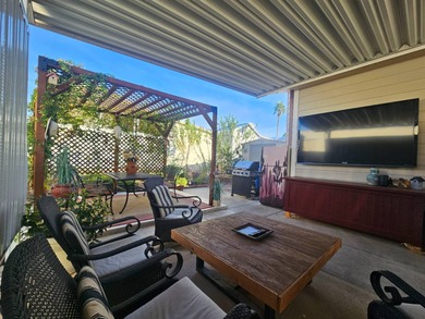 This home is a true delight inside and out! It features an open on Viewpoint Golf Resort in Arizona - for sale on GolfHomes.com, golf home, golf lot