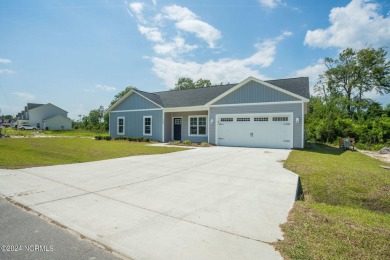 Your dream home is nearing completion in the charming, gated on Harbour Point Golf Club in North Carolina - for sale on GolfHomes.com, golf home, golf lot