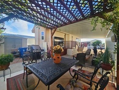 This home is a true delight inside and out! It features an open on Viewpoint Golf Resort in Arizona - for sale on GolfHomes.com, golf home, golf lot