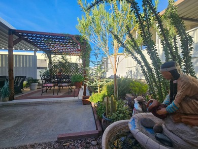 This home is a true delight inside and out! It features an open on Viewpoint Golf Resort in Arizona - for sale on GolfHomes.com, golf home, golf lot