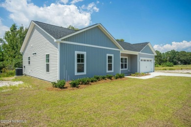 Your dream home is nearing completion in the charming, gated on Harbour Point Golf Club in North Carolina - for sale on GolfHomes.com, golf home, golf lot