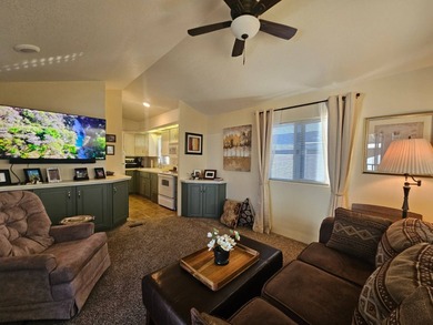 This home is a true delight inside and out! It features an open on Viewpoint Golf Resort in Arizona - for sale on GolfHomes.com, golf home, golf lot