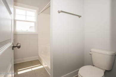 Your dream home is nearing completion in the charming, gated on Harbour Point Golf Club in North Carolina - for sale on GolfHomes.com, golf home, golf lot