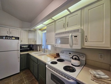 This home is a true delight inside and out! It features an open on Viewpoint Golf Resort in Arizona - for sale on GolfHomes.com, golf home, golf lot