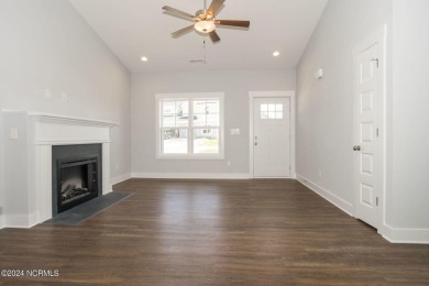 Your dream home is nearing completion in the charming, gated on Harbour Point Golf Club in North Carolina - for sale on GolfHomes.com, golf home, golf lot