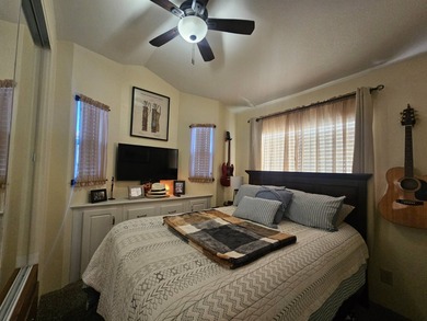 This home is a true delight inside and out! It features an open on Viewpoint Golf Resort in Arizona - for sale on GolfHomes.com, golf home, golf lot