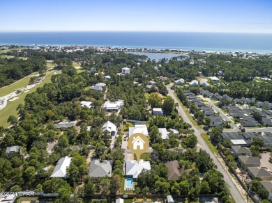 Nestled on an oversized lot, this single-level brick home in on Santa Rosa Golf and Beach Club in Florida - for sale on GolfHomes.com, golf home, golf lot