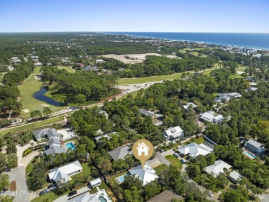 Nestled on an oversized lot, this single-level brick home in on Santa Rosa Golf and Beach Club in Florida - for sale on GolfHomes.com, golf home, golf lot