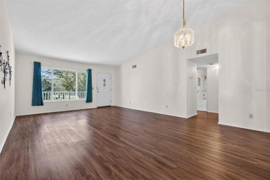 Step into this light-filled 2-bedroom, 2-bath condo on the West on On Top Of The World Golf Course in Florida - for sale on GolfHomes.com, golf home, golf lot