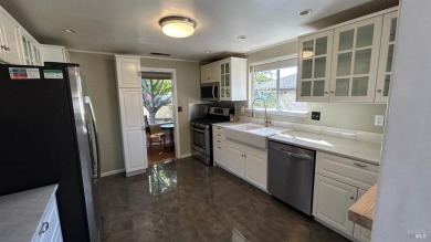 Single level, lovingly cared for and remodeled with updated on Oakmont Golf Club in California - for sale on GolfHomes.com, golf home, golf lot