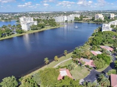 Discover this beautiful & rare VILLA nestled on a QUIET on Palm-Aire Country Club and Resort - Palms in Florida - for sale on GolfHomes.com, golf home, golf lot